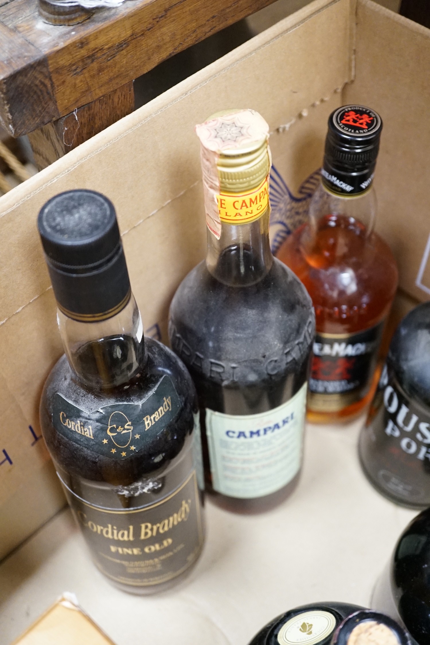 Nine bottles of selected spirits and port; to include Pousada Port, Whyte & Mackay scotch whisky, Courvoisier, Johnnie Walker Black Label scotch whisky and others (9)